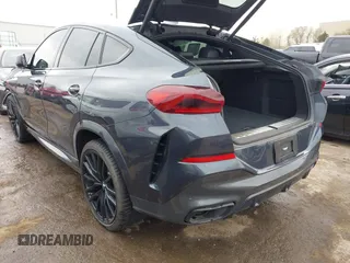 2022 BMW X6 xDrive40i z VIN 5UXCY6C08N9N30013, wystawiony jako IAAI lot #41772245 z przebiegiem 23 198 mil mil oraz . Historia ofert i sprzedaży dostępna na DreamBid. Obrazek 3.