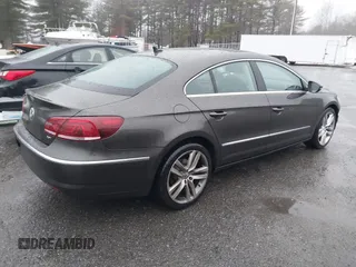 2013 Volkswagen CC Lux with VIN WVWRP7AN5DE554388, listed as a IAAI auction lot 41004116 with 162,457 mi miles. Bid and sale history available at carsss.com. Image 4.