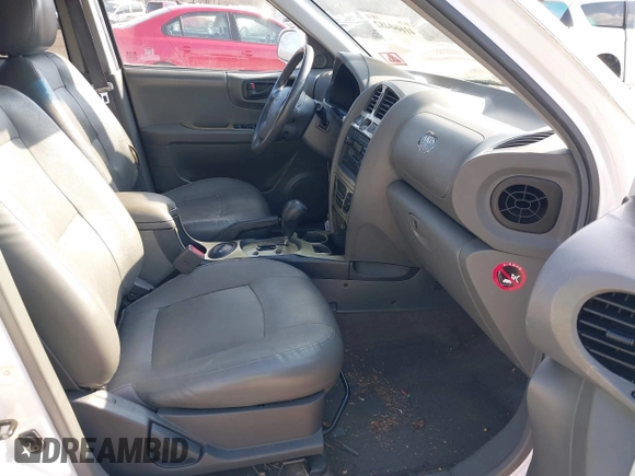 2002 Hyundai Santa Fe GLS with VIN KM8SC73D32U249942, listed as a IAAI auction lot 41660482 with 151,164 mi miles. Bid and sale history available at carsss.com. Image 5.