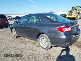 2013 Toyota Corolla L with VIN 2T1BU4EE9DC002558, listed as a IAAI auction lot 39670419 with 198,102 mi miles and . Bid and sale history available at DreamBid. Image 3.