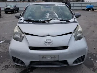 2012 Scion iQ with VIN JTNJJXB03CJ018641, listed as a Copart auction lot 82653104 with 118,617 mi miles and Salvage Title. Bid and sale history available at carsss.com. Image 5.