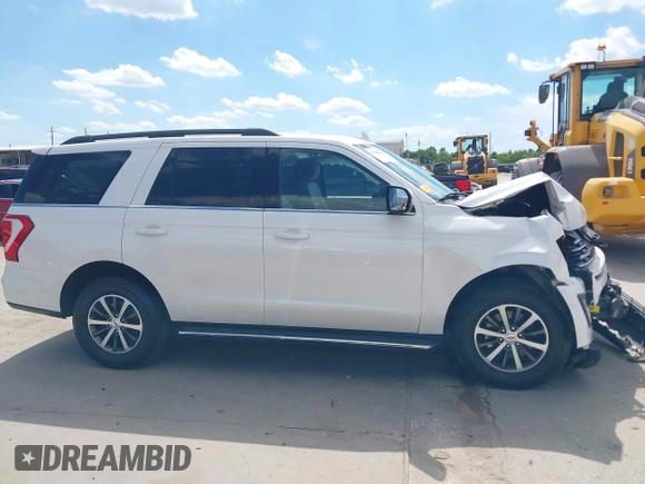2019 Ford Expedition XLT z VIN 1FMJU1HT3KEA07331, wystawiony jako IAAI lot #42201946 z przebiegiem 100 990 mil mil oraz . Historia ofert i sprzedaży dostępna na DreamBid. Obrazek 13.
