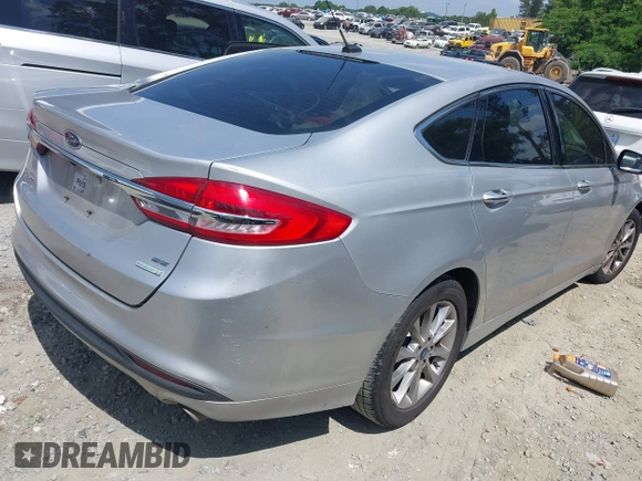 2017 Ford Fusion SE z VIN 3FA6P0HDXHR238713, wystawiony jako IAAI lot #42304140 z przebiegiem 157 630 mil mil oraz . Historia ofert i sprzedaży dostępna na DreamBid. Obrazek 4.