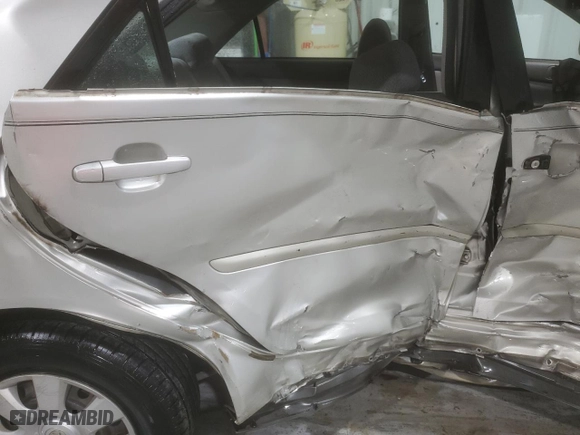 2004 Toyota Camry LE with VIN 4T1BE32K94U915756, listed as a Copart auction lot 50761005 with 404,136 mi miles and Salvage Title. Bid and sale history available at carsss.com. Image 10.