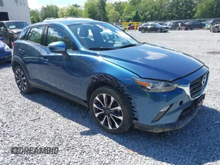 2019 Mazda CX-3 Touring z VIN JM1DKFC72K1459583, wystawiony jako IAAI lot #42380694 z przebiegiem 13 846 mil mil oraz . Historia ofert i sprzedaży dostępna na DreamBid. Obrazek 1.