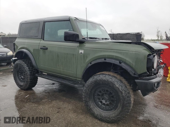 2021 Ford Bronco with VIN 1FMDE5AH7MLA79865, listed as a Copart auction lot 46552595 with 33,636 mi miles and Salvage Title. Bid and sale history available at carsss.com. Image 4.