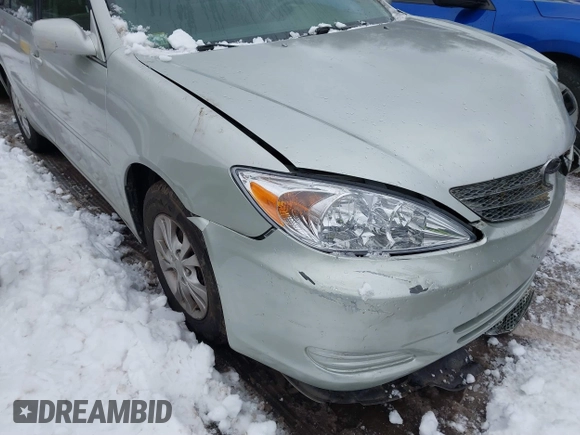 2004 Toyota Camry LE with VIN 4T1BF32K64U588682, listed as a IAAI auction lot 41520570 with 112,646 mi miles. Bid and sale history available at carsss.com. Image 13.
