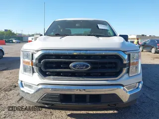2021 Ford F-150 XL with VIN 1FTEW1EP5MKE25613, listed as a IAAI auction lot 42028237 with 116,341 mi miles. Bid and sale history available at carsss.com. Image 6.