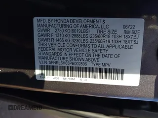 2023 Honda Odyssey EX-L with VIN 5FNRL6H65PB002896, listed as a IAAI auction lot 41559502 with 82,390 mi miles. Bid and sale history available at carsss.com. Image 9.
