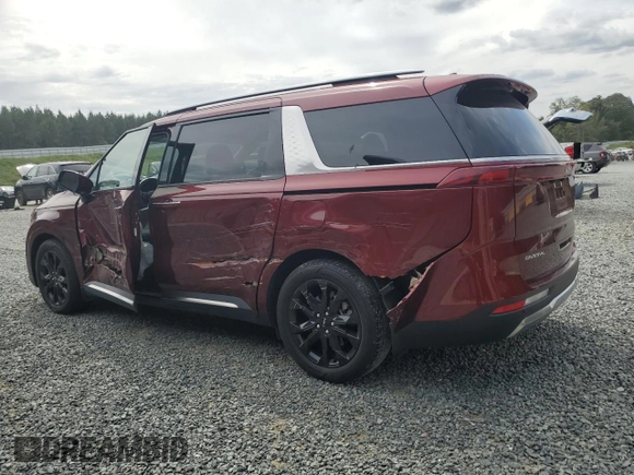 2024 Kia Carnival SX with VIN KNDNE5H37R6305573, listed as a Copart auction lot 70764084 with 23,492 mi miles and Salvage Title. Bid and sale history available at DreamBid. Image 2.