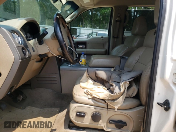 2007 Ford F-150 XLT с VIN 1FTPW12V67FB82595, выставлен на аукционе Copart как лот 58973135 с пробегом 292 855 миль миль и Списание • Salvage title. История ставок и продаж доступна на DreamBid. Изображение 7.