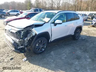 2024 Toyota RAV4 Hybrid XLE Premium with VIN JTMB6RFV3RJ045018, listed as a IAAI auction lot 41610974 with 13,765 mi miles. Bid and sale history available at carsss.com. Image 2.
