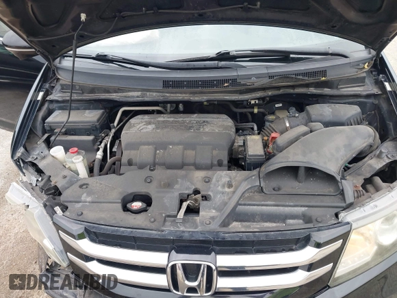 2015 Honda Odyssey Touring Elite with VIN 5FNRL5H97FB124565, listed as a IAAI auction lot 42358412 with 206,444 mi miles and . Bid and sale history available at DreamBid. Image 10.