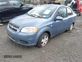 2007 Chevrolet Aveo LS with VIN KL1TD56667B175174, listed as a IAAI auction lot 42012342 with 100,534 mi miles and . Bid and sale history available at DreamBid. Image 2.