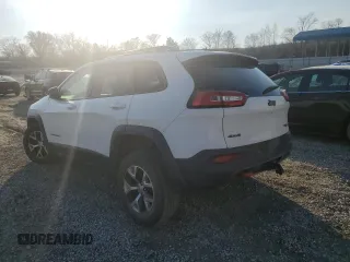 2015 Jeep Cherokee Trailhawk z VIN 1C4PJMBSXFW642149, wystawiony jako Copart lot #46656565 z przebiegiem 100 496 mil mil oraz Szkoda całkowita • Salvage title. Historia ofert i sprzedaży dostępna na DreamBid. Obrazek 2.