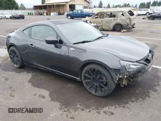 2015 Scion FR-S z VIN JF1ZNAA16F9710455, wystawiony jako IAAI lot #41838228 z przebiegiem 103 097 mil mil oraz . Historia ofert i sprzedaży dostępna na DreamBid. Obrazek 1.