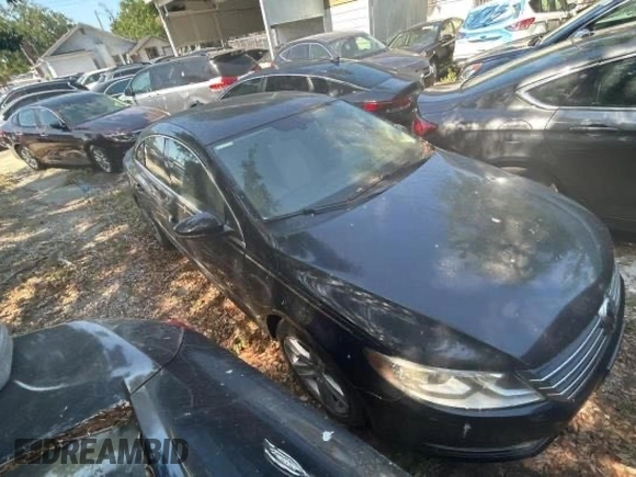 2013 Volkswagen CC Sport with VIN WVWBP7AN3DE504851, listed as a Copart auction lot 62174375 with 104,533 mi miles and Salvage title. Bid and sale history available at DreamBid. Image 1.