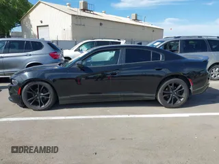 2016 Dodge Charger SXT with VIN 2C3CDXHG6GH146764, listed as a IAAI auction lot 42020618 with 154,693 mi miles and . Bid and sale history available at carsss.com. Image 14.