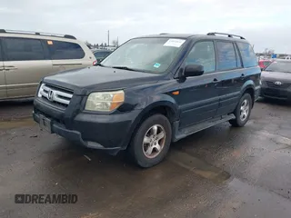 2006 Honda Pilot EX-L with VIN 2HKYF18726H552054, listed as a IAAI auction lot 41822652 with 153,822 mi miles and . Bid and sale history available at DreamBid. Image 2.