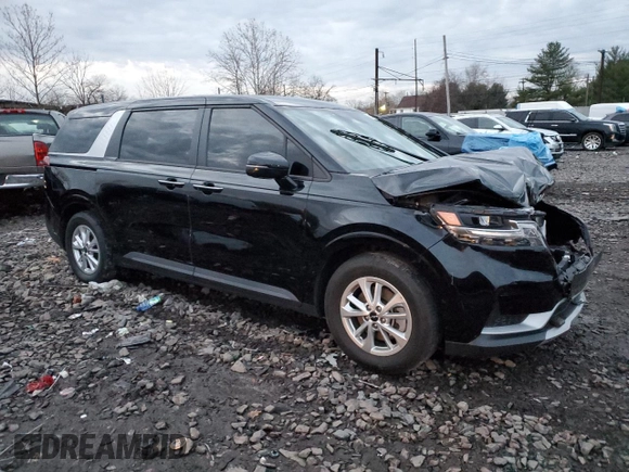 2023 Kia Carnival LX with VIN KNDNB4H32P6290920, listed as a Copart auction lot 82141794 with 28,597 mi miles and Salvage Title. Bid and sale history available at carsss.com. Image 4.