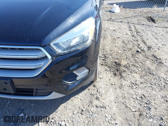 2018 Ford Escape SE z VIN 1FMCU9GD5JUB15259, wystawiony jako IAAI lot #42182040 z przebiegiem 122 194 mil mil oraz . Historia ofert i sprzedaży dostępna na DreamBid. Obrazek 18.