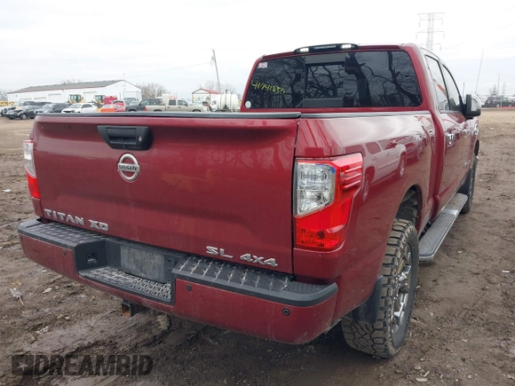 2017 Nissan Titan XD PRO-4X with VIN 1N6BA1F41HN570333, listed as a IAAI auction lot 41741250 with 62,948 mi miles. Bid and sale history available at carsss.com. Image 4.