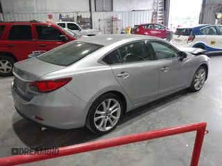 2014 Mazda 6 i Touring with VIN JM1GJ1T51E1106970, listed as a IAAI auction lot 42027350 with 113,756 mi miles and . Bid and sale history available at DreamBid. Image 4.