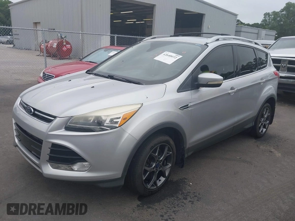2013 Ford Escape Titanium with VIN 1FMCU9J9XDUB51442, listed as a IAAI auction lot 42640022 with 105,540 mi miles and . Bid and sale history available at DreamBid. Image 2.