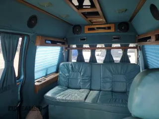 1995 GMC Safari z VIN 1GDDM19W2SB525888, wystawiony jako Copart lot #81358954 z przebiegiem 121 066 mil mil oraz Szkody całkowita. Historia ofert i sprzedaży dostępna na DreamBid. Obrazek 10.