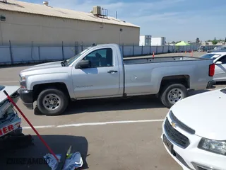 2016 Chevrolet Silverado 1500 Work Truck with VIN 1GCNCNEC2GZ297954, listed as a IAAI auction lot 42027288 with 167,218 mi miles. Bid and sale history available at carsss.com. Image 14.