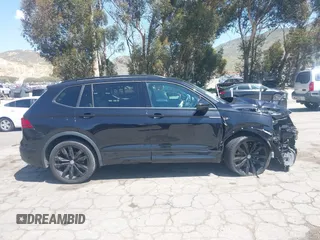 2021 Volkswagen Tiguan SE with VIN 3VV3B7AX0MM015825, listed as a IAAI auction lot 41955268 with 57,909 mi miles and . Bid and sale history available at DreamBid. Image 13.