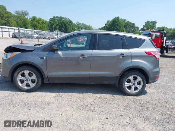 2014 Ford Escape SE with VIN 1FMCU9GXXEUE08655, listed as a IAAI auction lot 42469634 with 163,054 mi miles and . Bid and sale history available at DreamBid. Image 14.