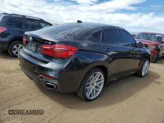 2015 BMW X6 xDrive50i with VIN 5UXKU6C5XF0F94498, listed as a Copart auction lot 67776034 with 106,579 mi miles and Non Repairable. Bid and sale history available at carsss.com. Image 3.