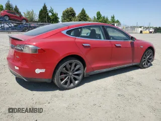 2014 Tesla Model S 60 with VIN 5YJSA1H17EFP29100, listed as a Copart auction lot 65081725 with 130,377 mi miles and Clean title. Bid and sale history available at DreamBid. Image 3.
