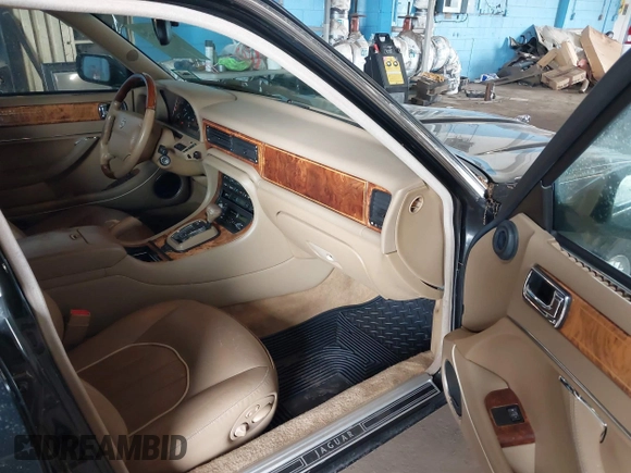 1997 Jaguar XJ Vanden Plas with VIN SAJKX6243VC800080, listed as a IAAI auction lot 42190859 with 192,979 mi miles and . Bid and sale history available at DreamBid. Image 5.