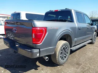 2023 Ford F-150 XL with VIN 1FTFW1E5XPFA64539, listed as a IAAI auction lot 41814306 with 58,207 mi miles and . Bid and sale history available at carsss.com. Image 4.