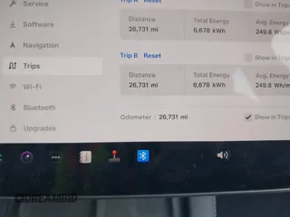 2023 Tesla Model Y Long Range z VIN 7SAYGDEE6PA169168, wystawiony jako IAAI lot #42050428 z przebiegiem 26 731 mil mil oraz . Historia ofert i sprzedaży dostępna na DreamBid. Obrazek 7.