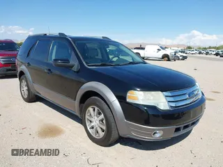 2008 Ford Taurus X SEL z VIN 1FMDK02W98GA35857, wystawiony jako IAAI lot #42631246 z przebiegiem 139 723 mil mil oraz . Historia ofert i sprzedaży dostępna na DreamBid. Obrazek 1.