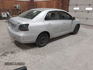 2008 Toyota Yaris with VIN JTDBT903781251568, listed as a IAAI auction lot 42090260 with 264,356 mi miles. Bid and sale history available at carsss.com. Image 4.