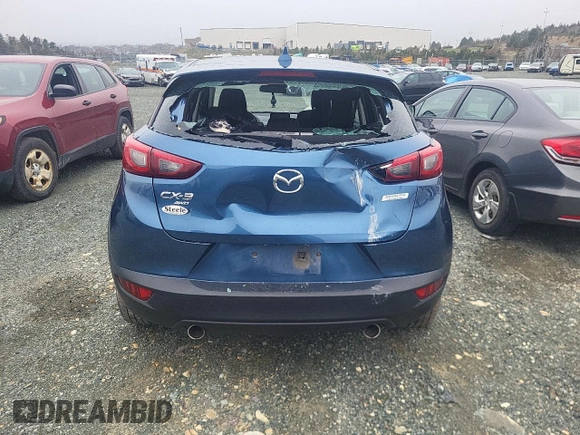 2019 Mazda CX-3 Touring z VIN JM1DKFC78K0414606, wystawiony jako Copart lot #56095515 z przebiegiem Nie podano mil oraz Szkoda całkowita • Salvage title. Historia ofert i sprzedaży dostępna na DreamBid. Obrazek 6.