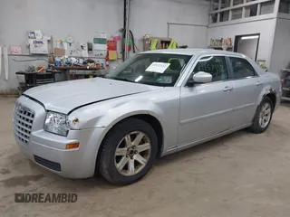 2006 Chrysler 300 with VIN 2C3LA43R06H417610, listed as a IAAI auction lot 42157332 with 202,364 mi miles and . Bid and sale history available at carsss.com. Image 2.