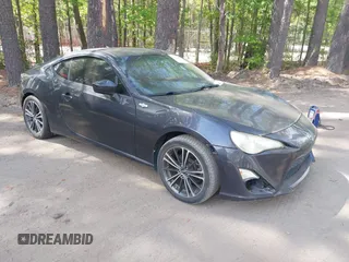 2013 Scion FR-S with VIN JF1ZNAA12D1718693, listed as a IAAI auction lot 42077260 with 110,164 mi miles. Bid and sale history available at carsss.com. Image 1.