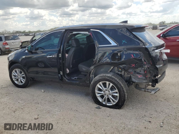 2024 Cadillac XT5 FWD Luxury with VIN 1GYKNAR42RZ731988, listed as a Copart auction lot 72777544 with 5,965 mi miles and Salvage title. Bid and sale history available at DreamBid. Image 2.