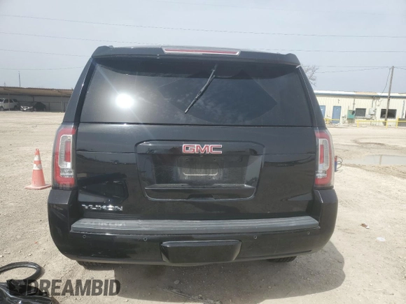 2019 GMC Yukon SLT with VIN 1GKS2BKC5KR166412, listed as a Copart auction lot 48030905 with 125,774 mi miles and Salvage Title. Bid and sale history available at DreamBid. Image 6.