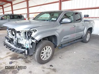 2025 Toyota Tacoma SR with VIN 3TMLB5JN7SM100983, listed as a IAAI auction lot 42220559 with 2,119 mi miles and . Bid and sale history available at DreamBid. Image 18.