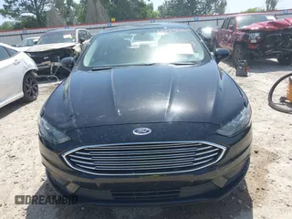 2017 Ford Fusion SE z VIN 3FA6P0HDXHR198388, wystawiony jako IAAI lot #42231069 z przebiegiem 143 709 mil mil oraz . Historia ofert i sprzedaży dostępna na DreamBid. Obrazek 11.