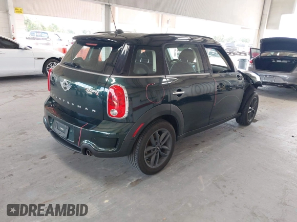 2013 MINI Countryman S with VIN WMWZC3C56DWP24170, listed as a IAAI auction lot 42366594 with 143,311 mi miles and . Bid and sale history available at DreamBid. Image 4.