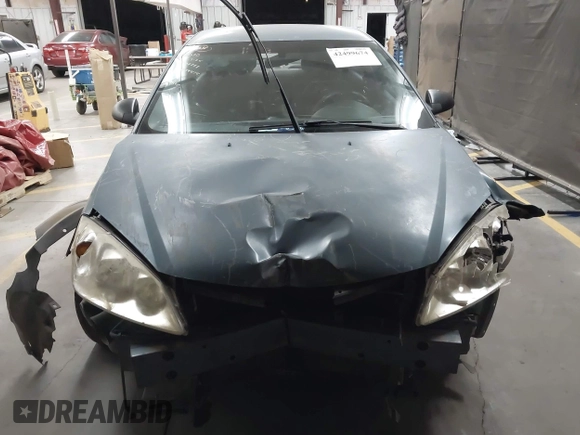 2006 Pontiac G6 6-Cyl z VIN 1G2ZG558464257988, wystawiony jako IAAI lot #42499674 z przebiegiem Nie podano mil oraz . Historia ofert i sprzedaży dostępna na DreamBid. Obrazek 13.