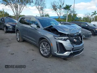 2023 Cadillac XT6 AWD Premium Luxury with VIN 1GYKPDRS0PZ158595, listed as a IAAI auction lot 41051122 with 39,653 mi miles. Bid and sale history available at carsss.com. Image 1.