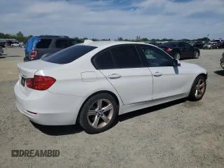 2015 BMW 3 Series 320i with VIN WBA3B1C52FK136581, listed as a Copart auction lot 52803405 with 138,495 mi miles and Salvage Title. Bid and sale history available at carsss.com. Image 3.
